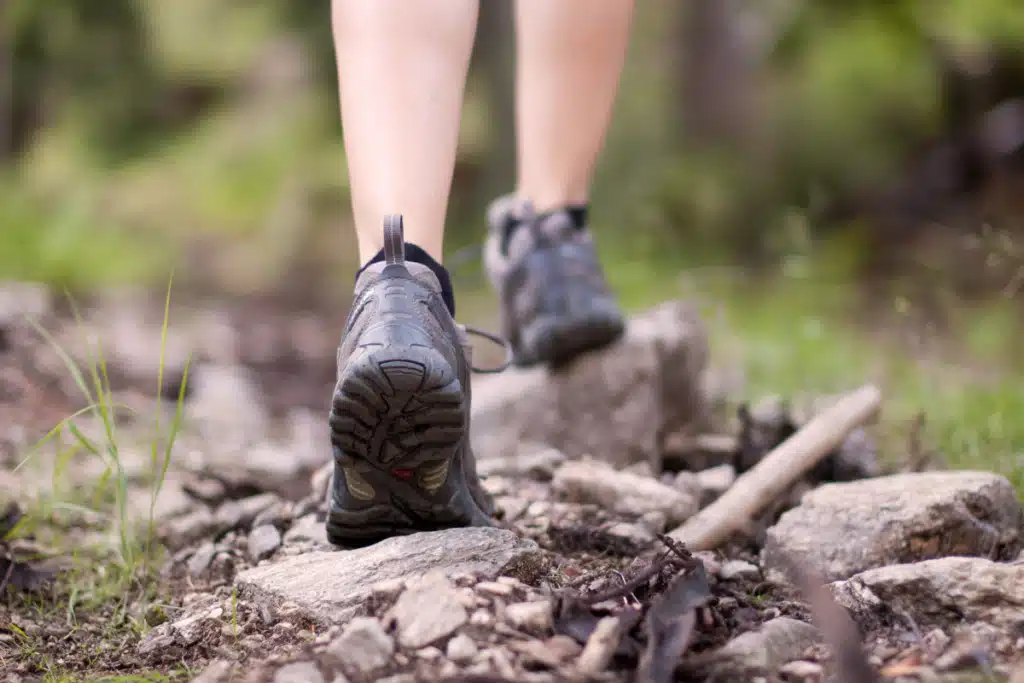 girl hiking using hiking boots