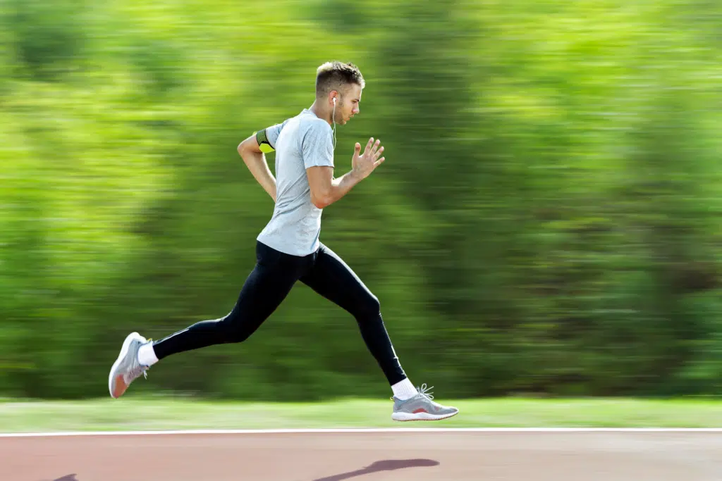 Man running fast with a threshold heart rate