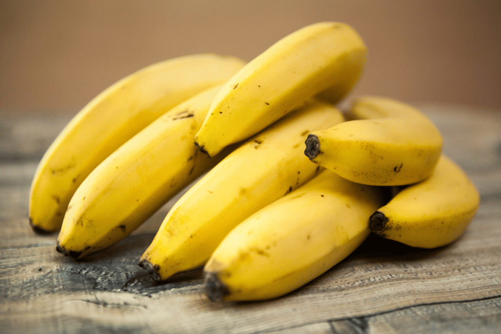 Bananas help prevent cramps because they contain high levels of potassium and are made up of simple sugars that are easily digestible for quick energy.