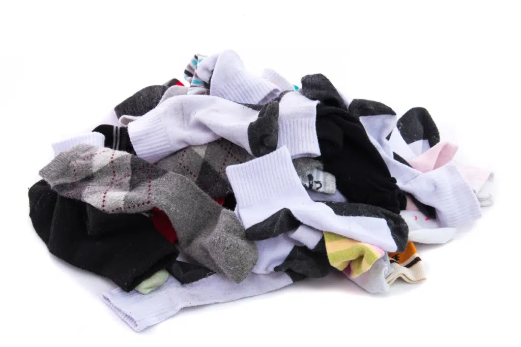 If you're having trouble getting the smell out of your running socks, try doing a load of athletic apparel or just a load of socks.
